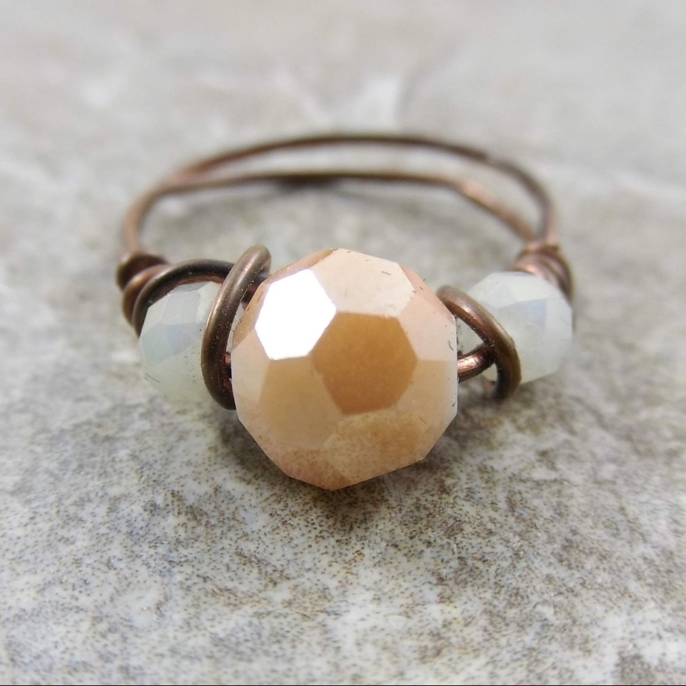 Copper ring with peach crystal